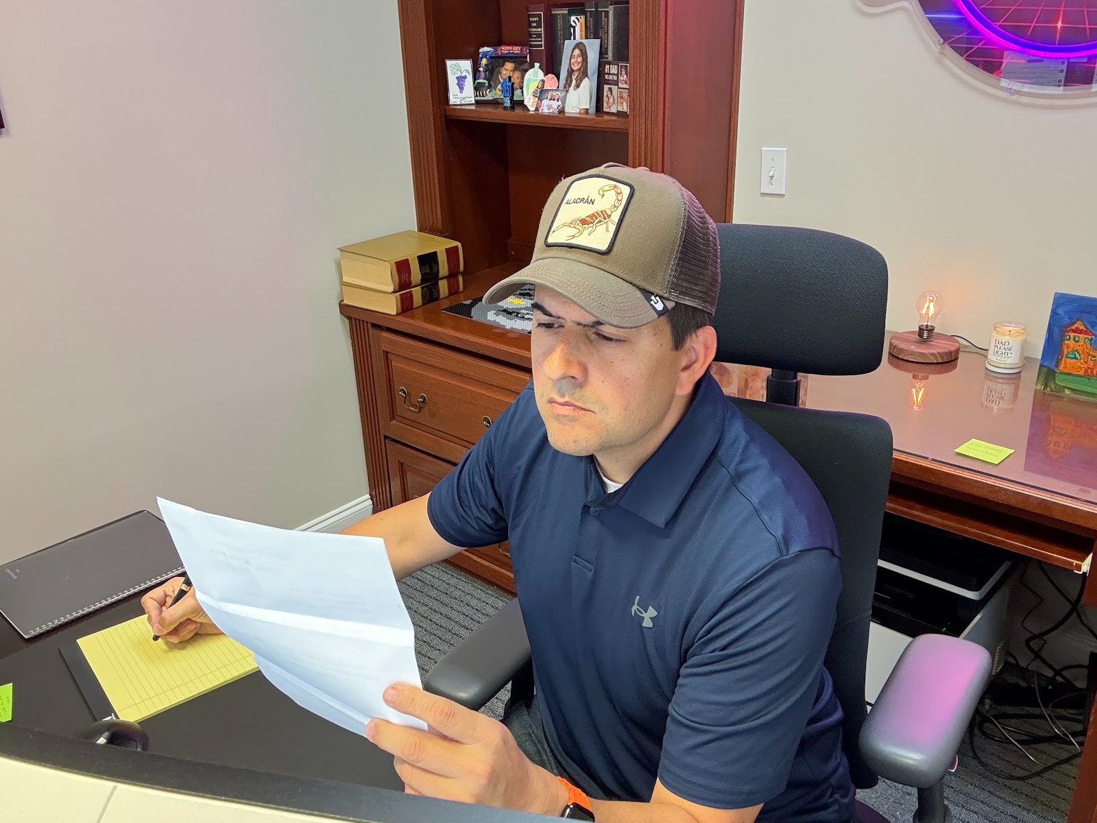 Your Georgia Workers' Comp Claim Got Denied. Here's Exactly What I'd Do Next. 1 Georgia workers’ compensation attorney Rick DeMedeiros reviewing a claim denial letter at his Alpharetta office desk